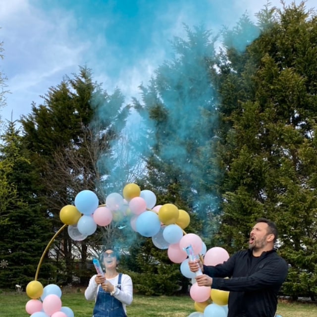 gender reveal powder cannon blue scene